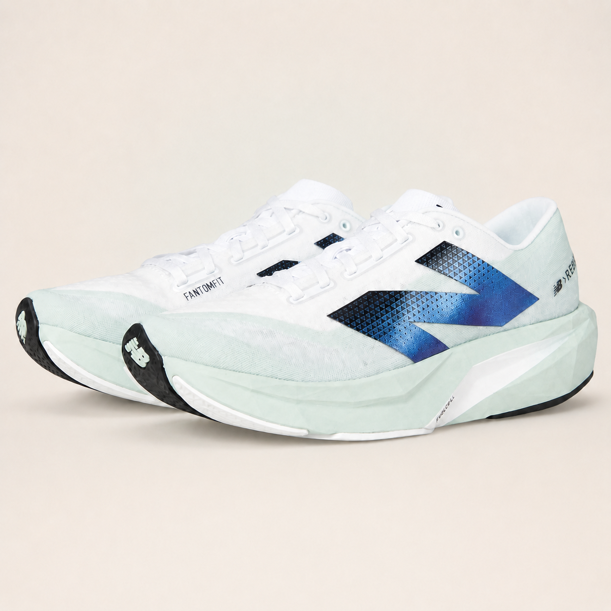 New Balance FuelCell Rebel v4 White and mint — pair view