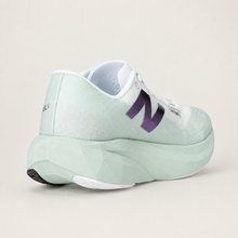 New Balance FuelCell Rebel v4 White and mint — rear view