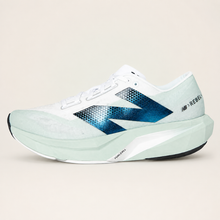 New Balance FuelCell Rebel v4 White and mint — side view