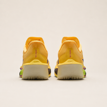 Nike Zoom Fly 6 pastel light yellow — rear studio view