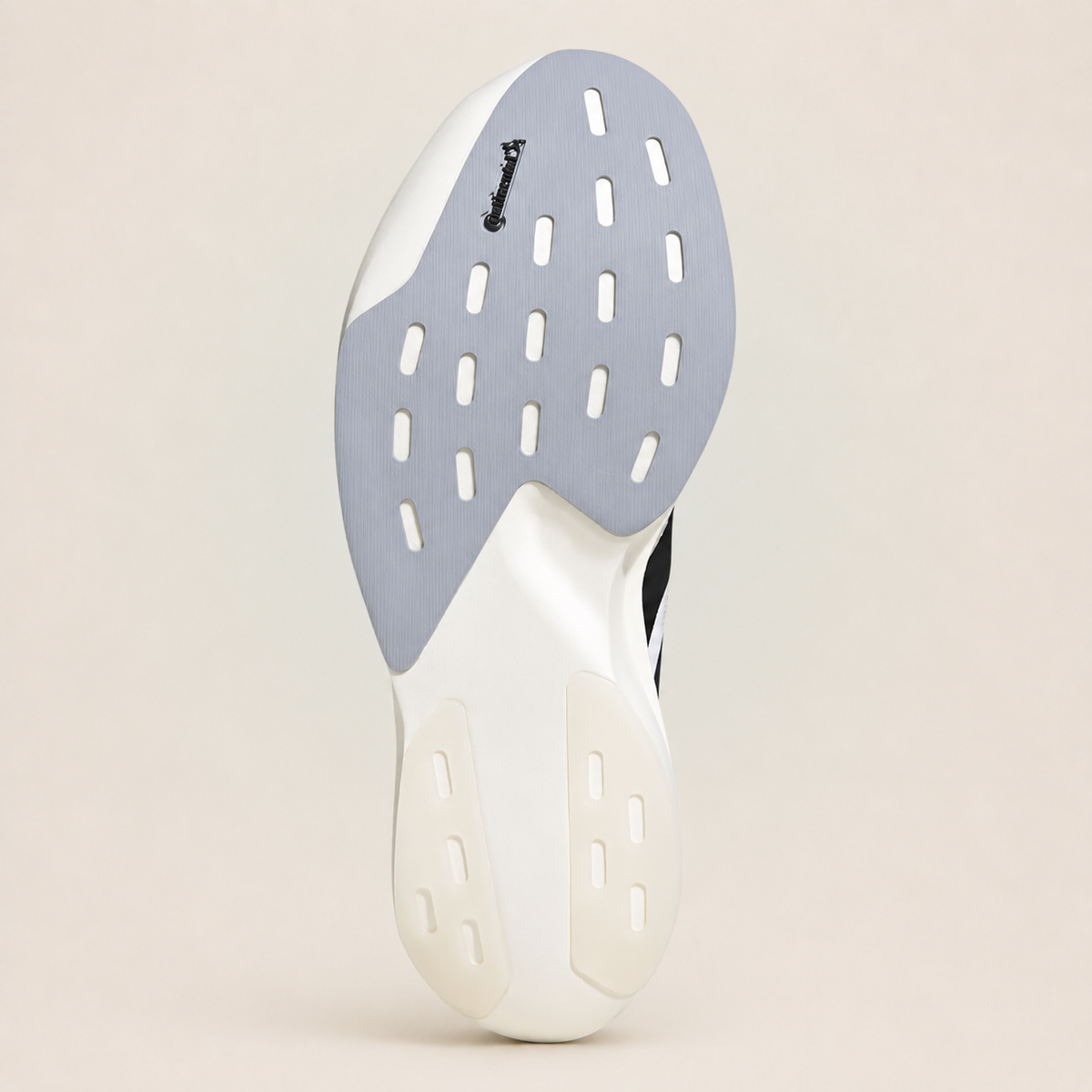 Adidas Adizero EVO SL White — outsole view on studio background
